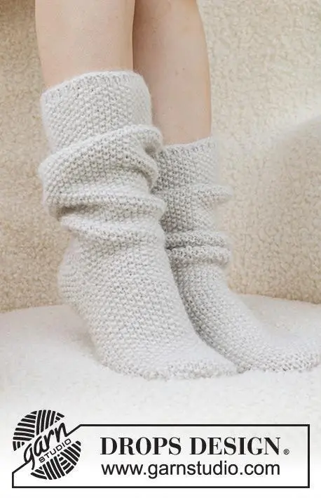234-73 Snow White Socks by DROPS Design